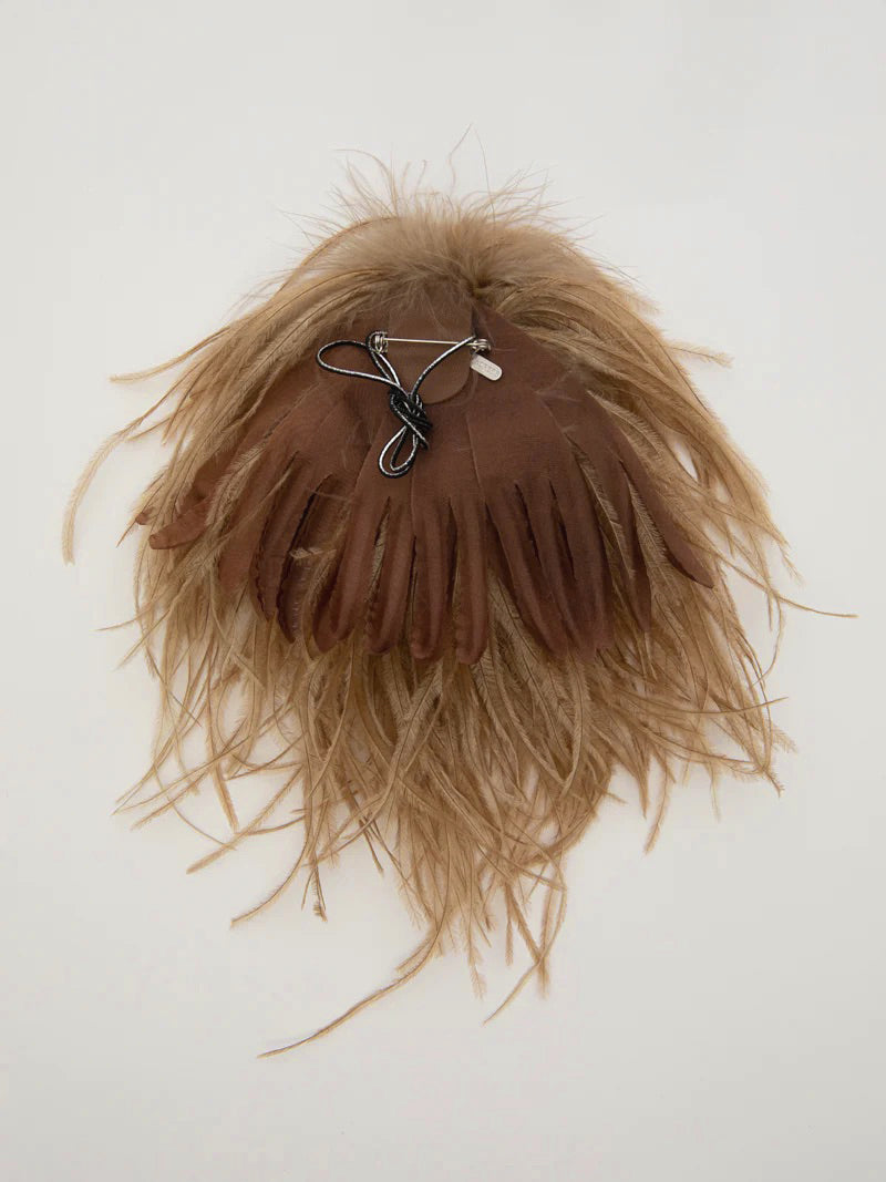 Broches en plumes